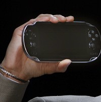 Sony Computer Entertainment president and CEO Kazuo Hirai shows off a new PlayStation Portable NGP (AP)